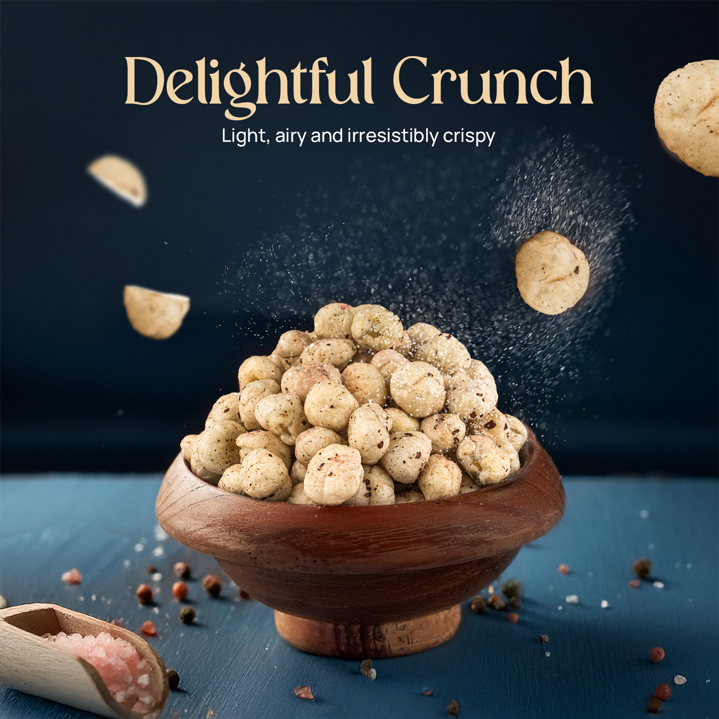 Bowl of salted makhana bites with a dusting of pink salt granules